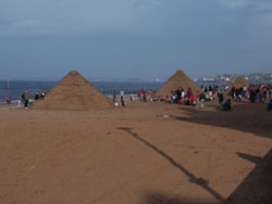 3 pyramids built out of sandbags on Portobello beach during the summer of 2007